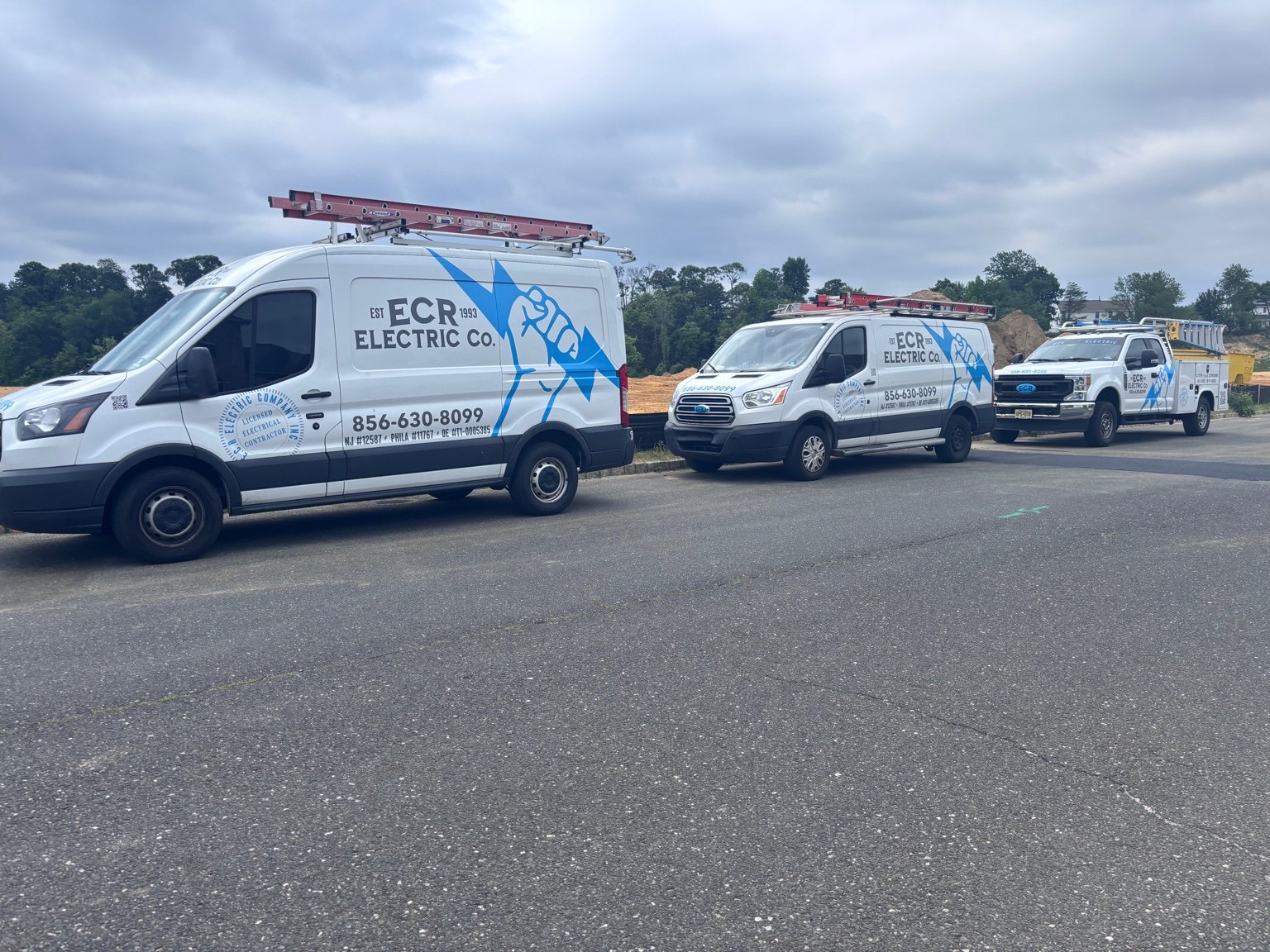 ECR Electric company vehicles at a job site