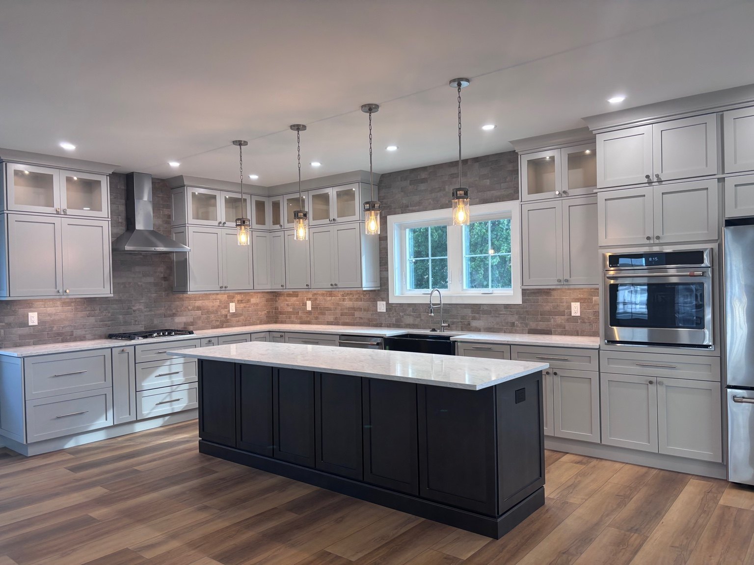 Modern kitchen with pendant lighting installed