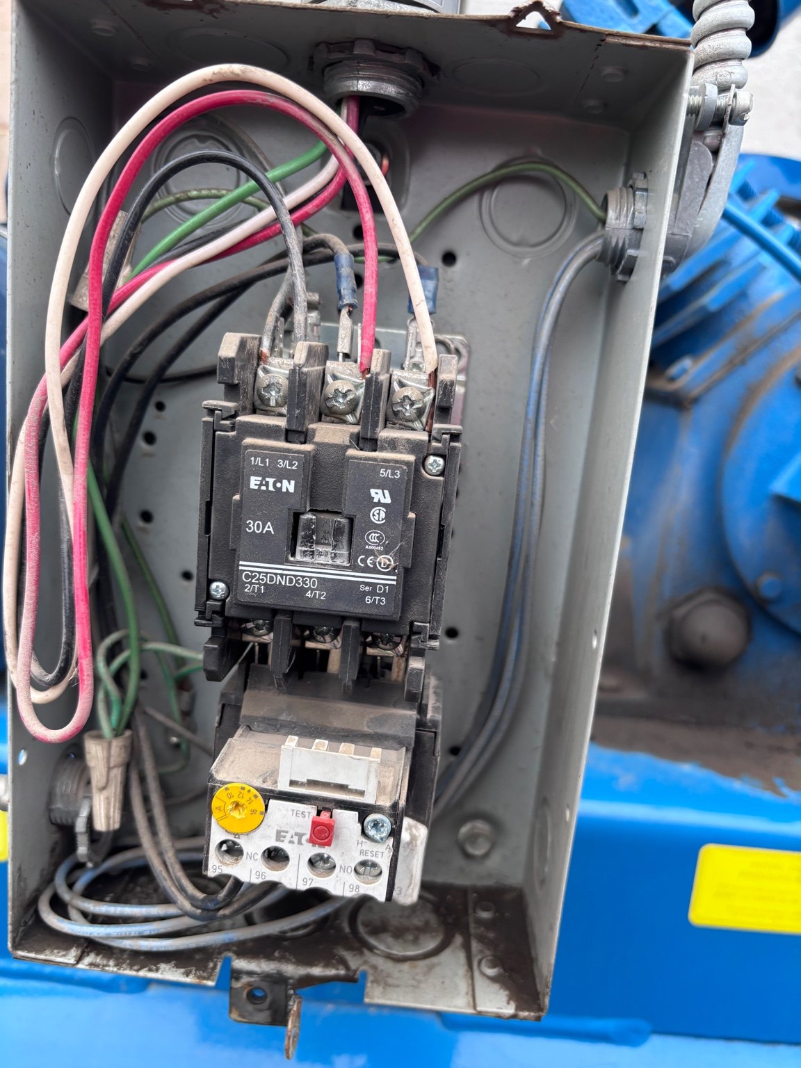 Close-up of an Eaton motor starter and overload relay